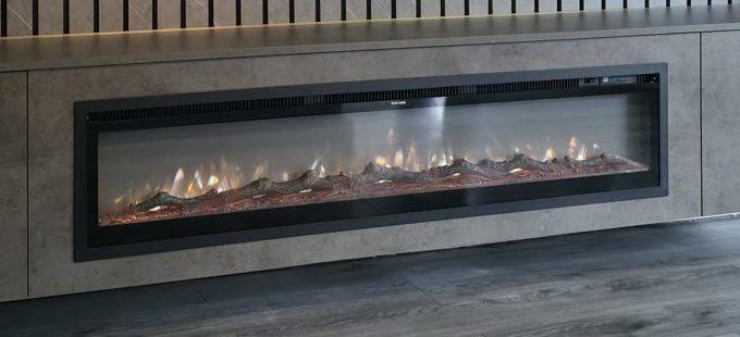 Linear electric fire glowing inside a handmade media wall cabinet